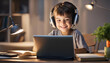 © anmitsu - Happy smiling child studying on computer