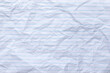 © lllonajalll - Top view empty rumpled lined paper with wrinkled. Notebook lined paper background and texture.