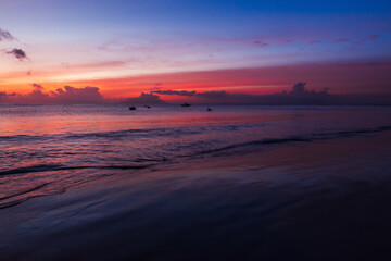 Wall Mural - Seaside landscape, shore water under colorful sky at sunset. Seychelles