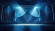 Empty stage with blue curtains and spotlights.