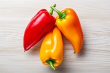 Top View Of Three Vibrant Peppers On A White Background. Generative AI