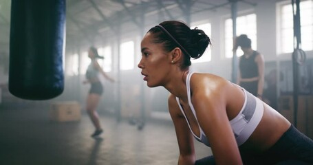 Wall Mural - Woman, breathing and tired after boxing in gym for fitness, wellness and fight with punching bag and power. Health, exercise and self defense, recover from sports workout with sweat and boxer athlete