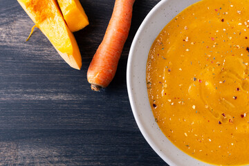 Wall Mural - Pumpkin and carrot cream soup. Autumn dish suitable for lunch and dinner.