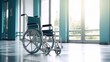 © Gethuk_Studio - Wheelchair parked in the hospital corridor copy space background, self care for patient service mobility