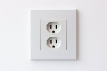 white wall mounted socket board with two electrical sockets and a switch. the socket board is isolat