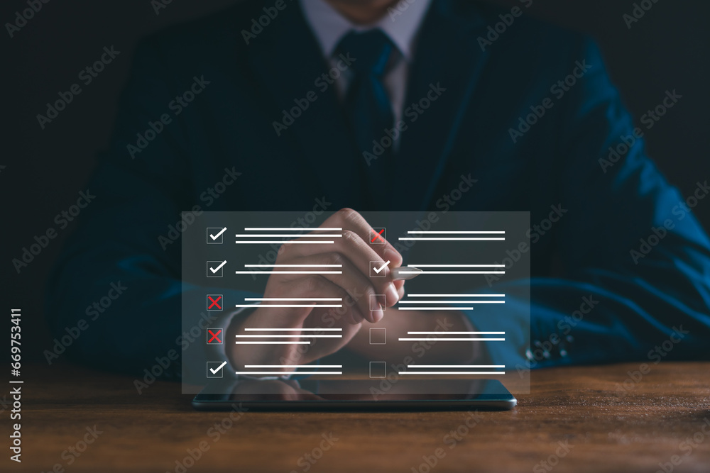 Foto de Stock Check list concept. Businessman tick off questionnaire ...
