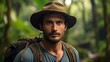 © Pro Hi-Res - Portrait of a male hiker wearing hat in rainforest.