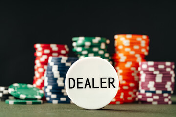 Stacks of poker chips on table close up