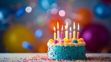 Colorful Balloons And Birthday Cake With Candles: Celebrating A Joyful Occasion With Copy Space For Text