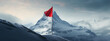 Leadership and success concept with blank red flag on mountain top. Mock up