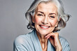 A Beautiful gorgeous 50s mid age beautiful elderly senior model woman with grey hair lightly smiling. Mature old lady close up portrait. Healthy face skin care, skincare cosmetics, Generative AI