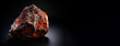 Painite is a rare precious natural geological stone on black background in low key. AI generated.