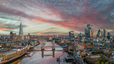 Fototapeta Fototapeta Londyn - London, England. Aerial view of London at sunrise looking over Tower Bridge, Tower of London, river Thames and Financial district. 