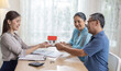 © SpaceOak - Elderly couples satisfying retirement home purchase with contract and key handover from a saleswoman