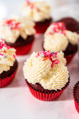 Wall Mural - Red Velvet Cupcakes with White Chocolate Ganache Frosting