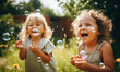 © Purple_Lamp - Joyful sisters chase shimmering bubbles in a vibrant field.