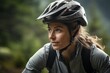 Close-Up: Woman Biking Through Summer Mountain Forest
