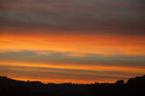 Fototapeta  - sunset over the field