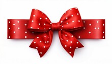 A Festive Red Bow With White Polka Dots