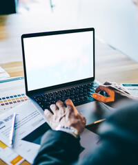 Digital computer with mock up screen for website with business person