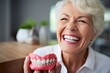 Happy Senior Woman Holding Dentures in Storage Area