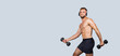© Prostock-studio - Happy handsome strong muscular millennial european man with beard, naked torso in wireless headphones