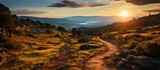 Fototapeta  - Landscape of mountain climbing trails and beautiful valley views, with sunset in the background.