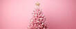 pink christmas banner with light pink christmas tree with place for text