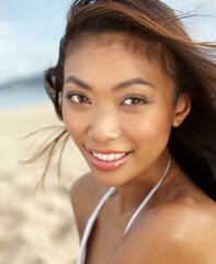 Wall Mural - Asian beauty model closeup on the beach