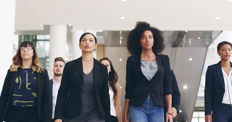 Wall Mural - Business people, mindset and walking in office building with solidarity, mission or goal focus. Serious, confidence and group of people in a lobby for team collaboration, growth and purpose together