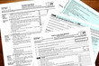 2023 tax forms on a desk.