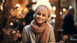 Young Muslim girl wearing hijab smiling and listening to music with headphones in a restaurant or cafe.