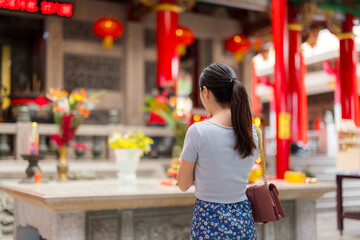 Sticker - Asian woman pray in Chinese temple