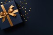 A beautiful blue gift box with a shiny gold bow, set against a dramatic black background. Perfect for any occasion and can be used to convey feelings of surprise, celebration, or appreciation.