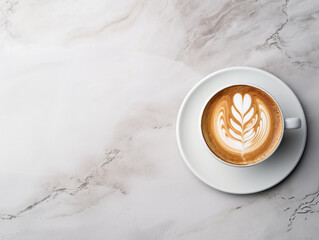 Cup of coffee on white marble table, latte art	