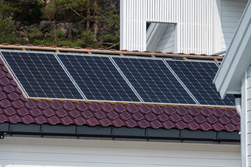 Solar panels on a garage roof.