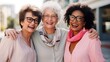 © Adriana - Multiracial senior women having fun together outdoor at city street- three happy mature trendy female friends hugging and laughing on urban place- Friendship lifestyle concept.