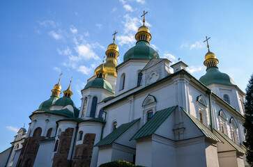 Wall Mural - 
Crosses and domes of the Saint Sophia's Cathedral dating back to the 11th century is an outstanding architectural monument of Kyiv, Ukraine