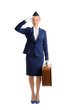 © Pixel-Shot - Young stewardess with suitcase on white background