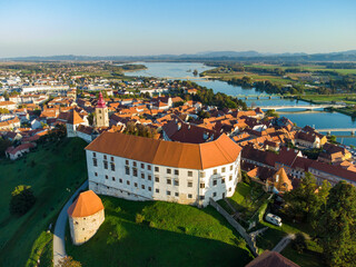 Ptuj in Slovenia, panoramic view with river Drava in foreground.