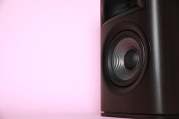 One wooden sound speaker on pink background, closeup. Space for text