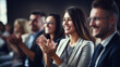© seogi - Shot of a group of businesspeople clapping during a conference - Generative AI
