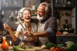 seniors active together time spending nner romantic meal food cooking preparing kitchen dancing parents family couple mature aged middle cheerful happy cook