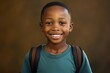 boy school african Smiling student children black happy education study elementary primary young american smile learning academic looking cute standing cheerful pupil casual attire