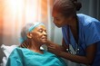 © akkash jpg - african senior patient female nurse woman black elderly disabled caregiver handicapped doctor medicals sick check-up surgeon office health care comforting pensioner men at work wheelchair intern