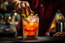 A close up of a bartender expertly mixing a vibrant rum punch cocktail, showcasing the artistry of drink preparation