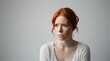 Portrait of a red hair woman with a deep sad expression  against white background, background image, AI generated