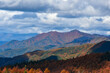 高ボッチ高原の紅葉の山と沸き立つ雲