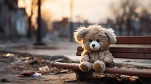 Very Sad Toy Soft Plush On A Bench Lost And Abandoned. Social Problems Loneliness And Depression Atmosphere