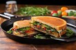 © altitudevisual - cast iron press on stuffed grilled sandwich with veggies